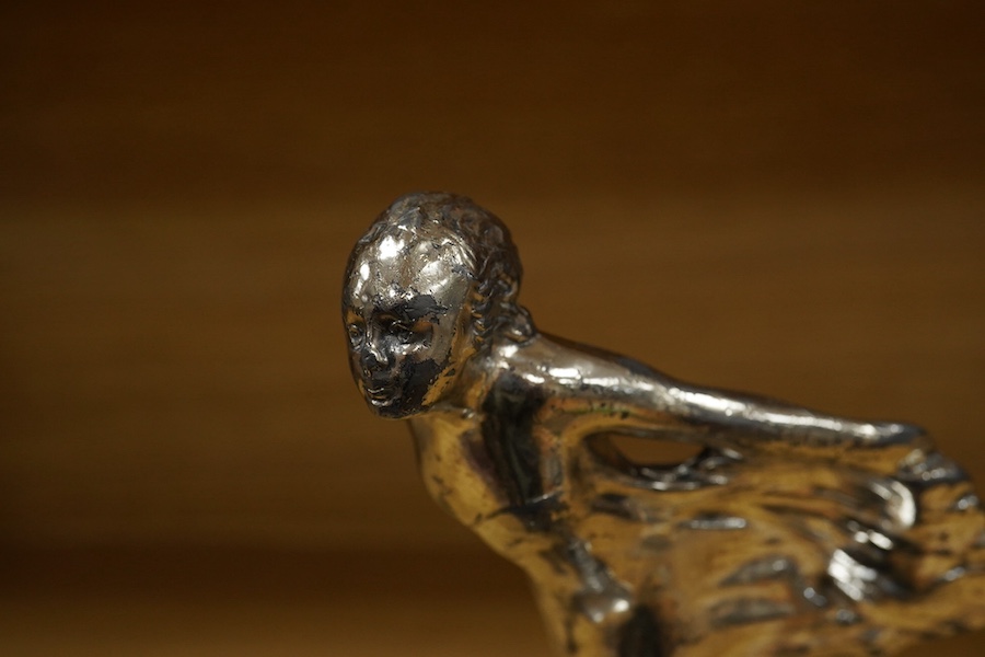 A Sykes style chromed car mascot in the form of an Art Deco woman with flowing gown, indistinctly signed to the base and dated 1922, mounted on a threaded radiator cap. Condition - fair to good.